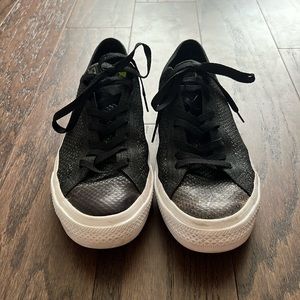 Men’s Converse low tops.